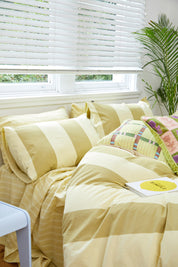 Breeze Lime Quilt Cover Set, lime green striped quilt with pillowcases, flat lay