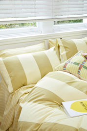 Breeze Lime Quilt Cover Set, lime green striped quilt with pillowcases, flat lay